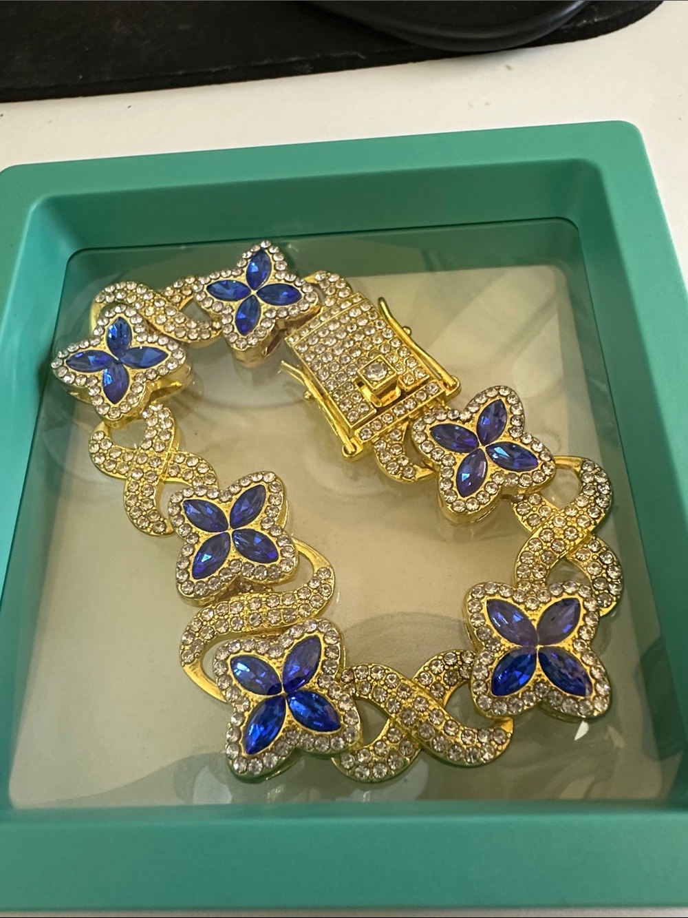 Gold-Tone Bracelet with Blue Gemflower Accents